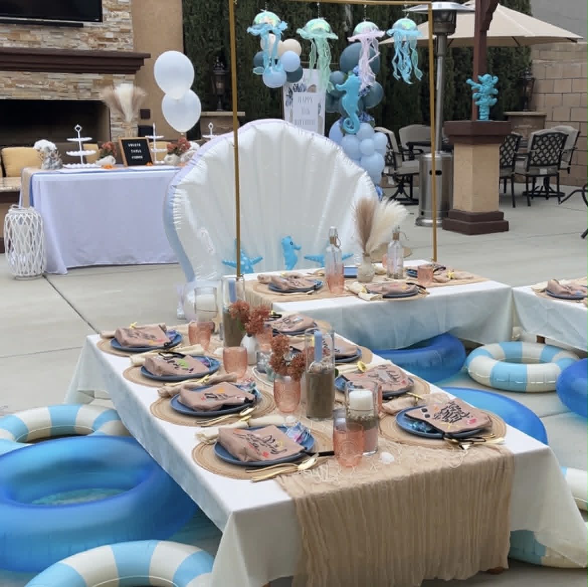 Under the sea birthday party with jellyfish and seashell decor